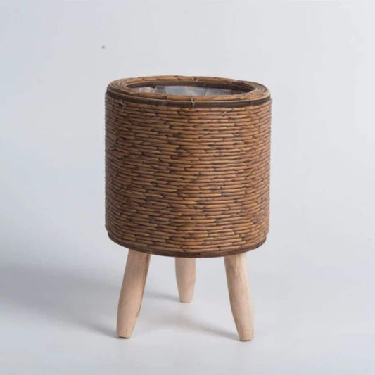 Cache pot effet rotin circulaire sur pieds