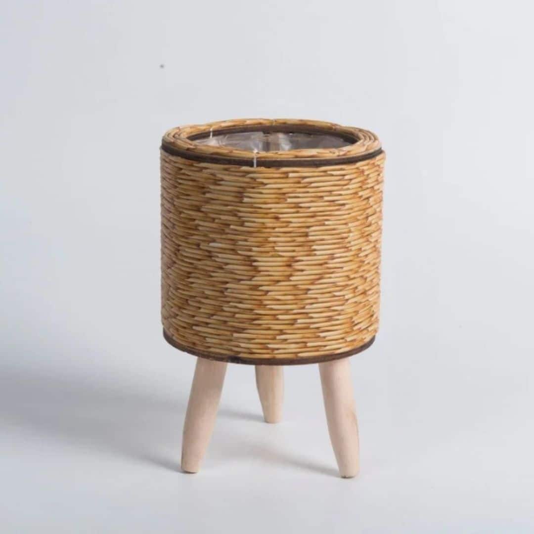 Cache pot effet rotin circulaire sur pieds