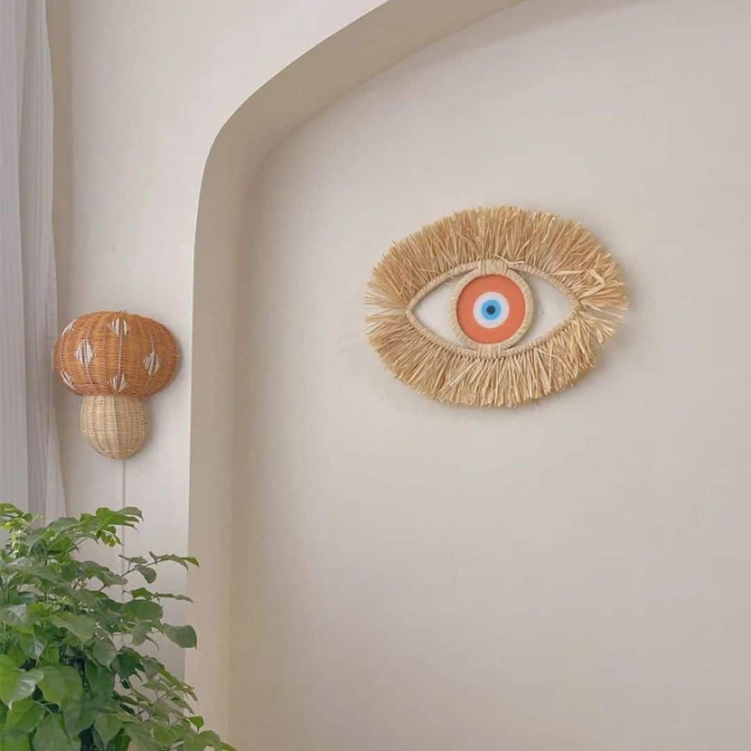 Décoration murale rotin au design d’œil