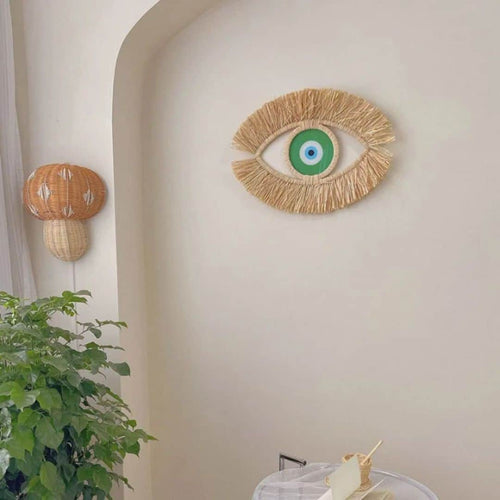Décoration murale rotin au design d’œil