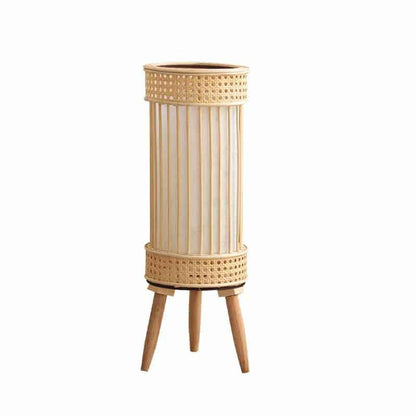 Lampadaire rotin au design rétro sur trépied