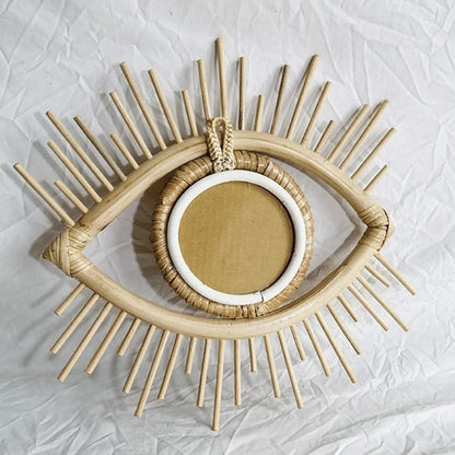 Miroir rotin en forme d'œil
